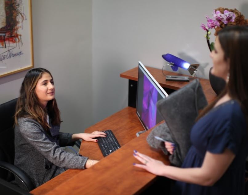 Receptionist and client talking at the reception desk at Navazon Digital in Los Angeles, Photo from Google My Business